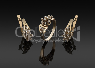 gold ring and earrings with diamonds