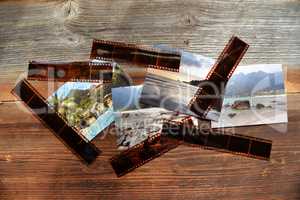 alte Filmstreifen Negative Fotos auf Holzbrett