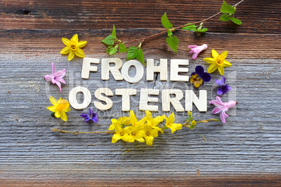 Frohe Ostern auf Holzhintergrund