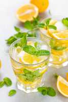 Lemon mojito cocktail with fresh mint, cold refreshing summer drink or beverage with ice