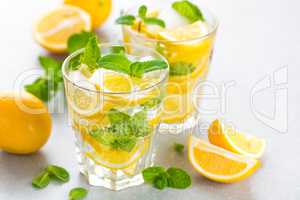 Lemon mojito cocktail with fresh mint, cold refreshing summer drink or beverage with ice