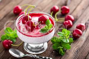 Fresh yogurt with cherry and chia seeds, delicious dessert for healthy breakfast