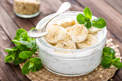 Fresh banana yogurt with oats, delicious dessert for healthy breakfast