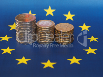 Euro coins, European Union, over flag