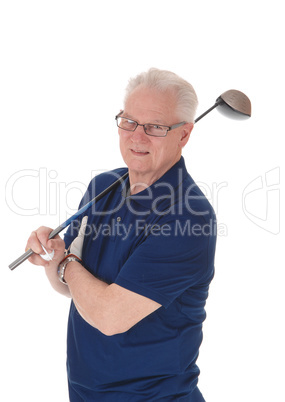 Senior man standing with golf iron.