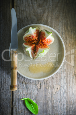 Fresh Juicy fig with a knife