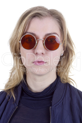 Young woman in sunglasses round glasses