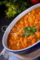 fish with vegetables in tomato sauce