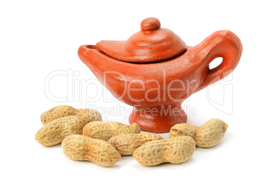 Peanuts and clay amphora isolated on white background