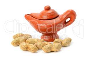Peanuts and clay amphora isolated on white background