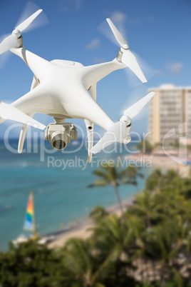 Unmanned Aircraft System (UAV) Quadcopter Drone In The Air Over