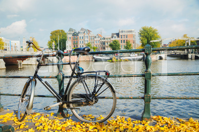 Bycicle parked at the bridge