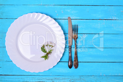 White plate with a paper sheet