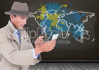 Detective looking through magnifying class with Colorful Map with paint splattered wall background