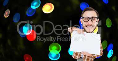 Digital composite image of nerd pointing at placard against colorful lights