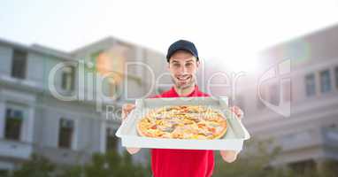 Delivery man showing pizza outside house
