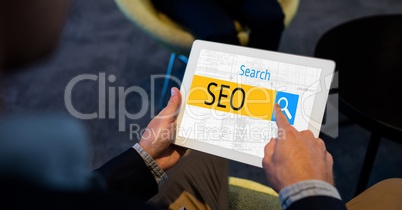 Hands touching search button with SEO written on it