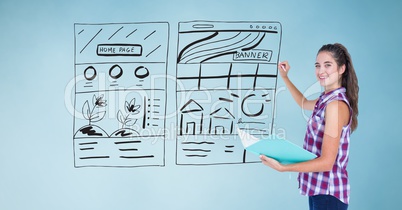 Side view of businesswoman drawing mock ups of website