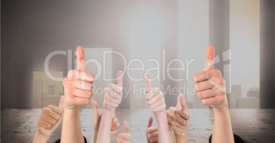 Digital composite image of hands gesturing thumbs up