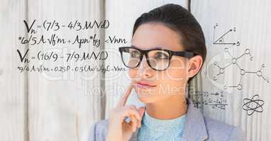 Thoughtful businesswoman with math equation