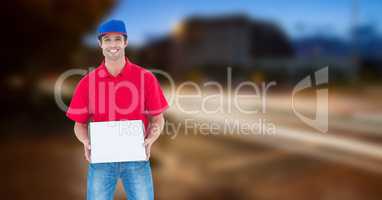 Delivery man holding pizza box