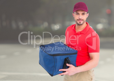 Pizza deliveryman, with delivery bag in the city