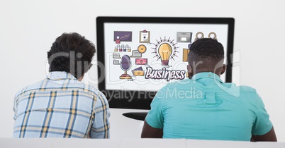 Rear view of man looking at business graphics on LED