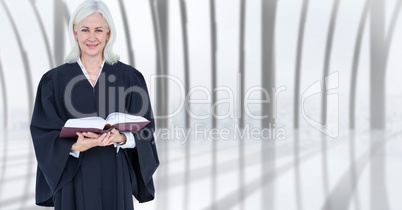 Confident female judge holding book