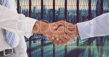 Cropped image of businessmen shaking hands