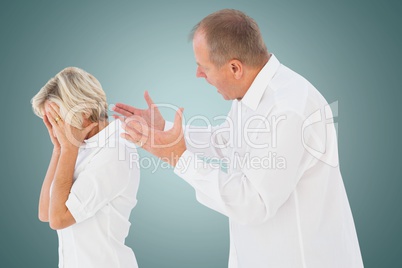 Side view of senior man arguing with woman