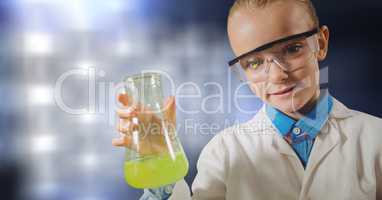 Little scientist holding chemical in flask