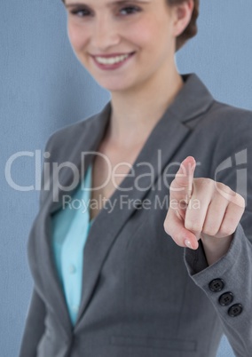 Smiling businesswoman pointing screen