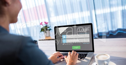 Businesswoman signing in on web page using laptop