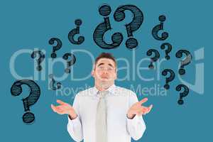 Digital composite image of confused businessman with question marks flying against blue background