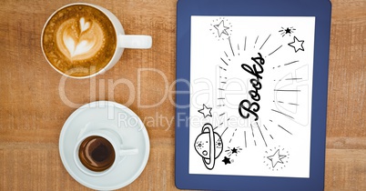 Overhead view of books graphics on tablet screen by coffee cups on table