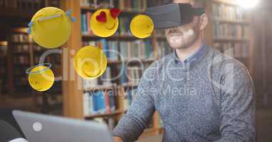 Man looking at emojis on VR glasses