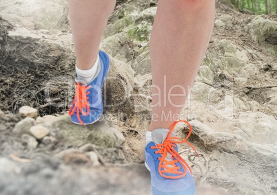 Legs Walking or jogging on rough nature terrain