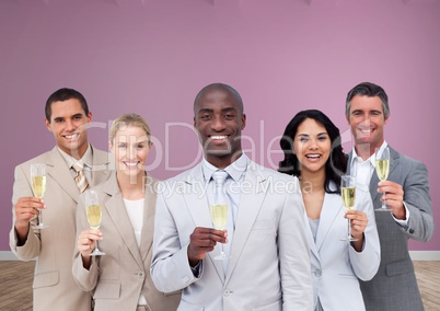 Business people holding champagne glasses in room