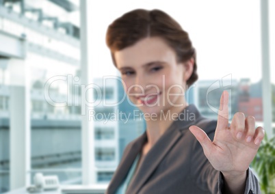 Composite image of smiling businesswoman standing