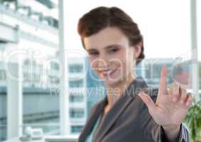Composite image of smiling businesswoman standing