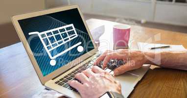 Businessman shopping online using laptop