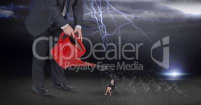 Digital composite image of businessman watering employee during thunder storm