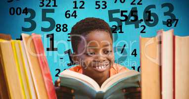 Digital composite image of boy studying with number flying in background