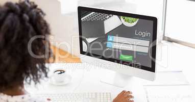 Businesswoman using log in page on computer