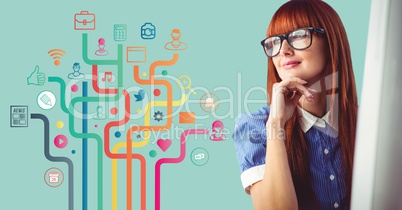 Woman at computer and business graphic against aqua background