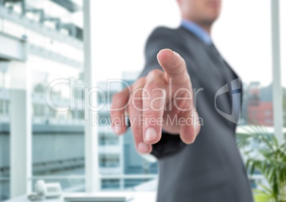 Composite image of smiling businessman standing