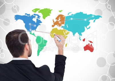 Businessman drawing on Colorful Map with connected background