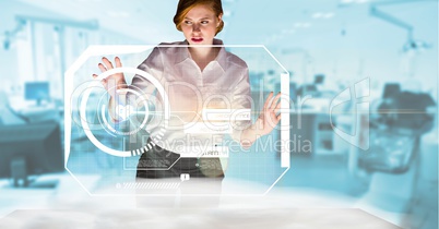 Digitally generated image of businesswoman touching futuristic screen