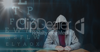 Digital composite image of hacker with letters