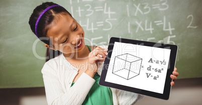Smiling girl looking at formula in digital tablet